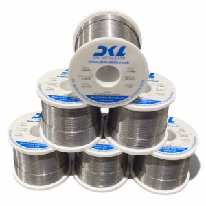 Stack of DKL Metals EQ-STD 60/40 Rosin Cored Solder Wire spools for professional electronics soldering.