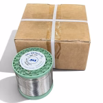 A 4kg reel of SAC 300 solid solder wire at 3mm diameter with a 16kg bulk box behind